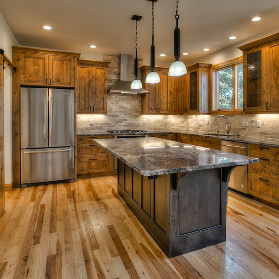 Image of a kitchen with wood grain cabinets